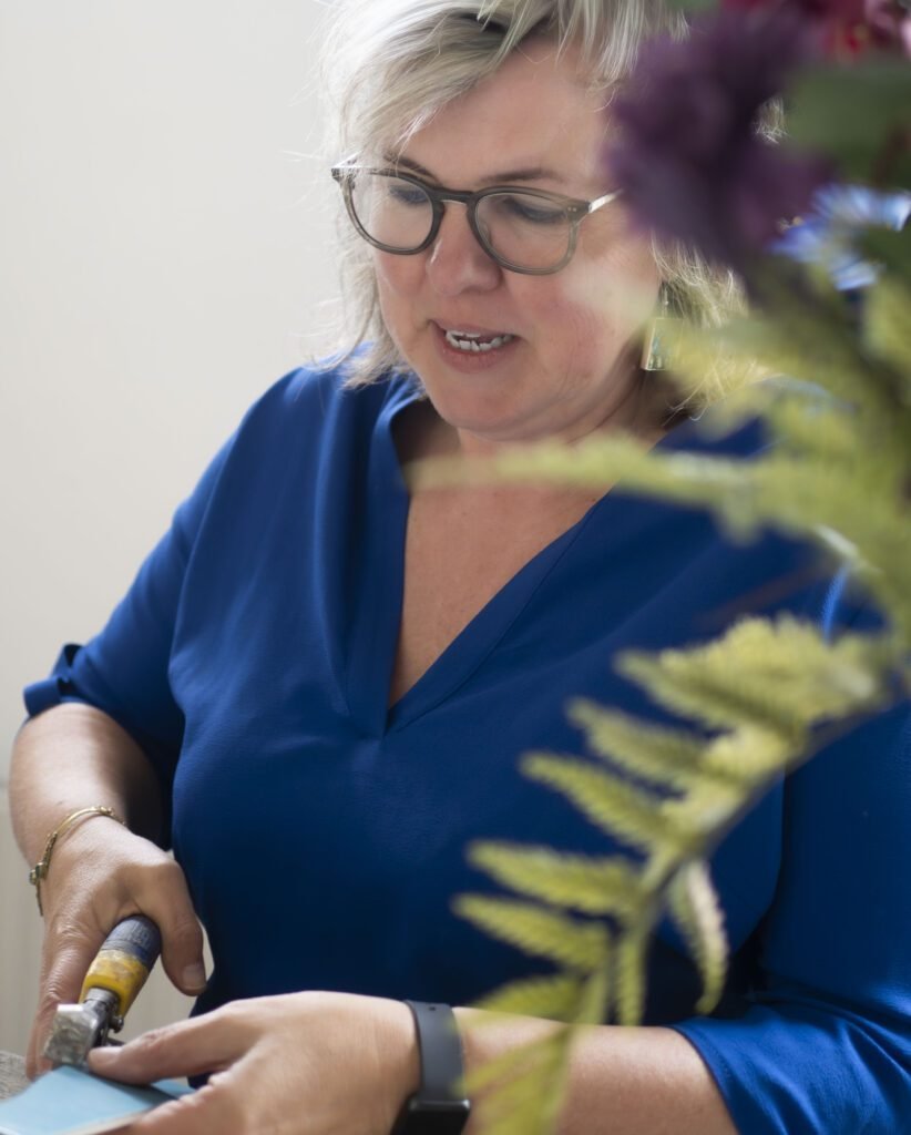 Petra aan het mozaïeken